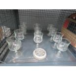 Cage containing quantity of brandy glasses
