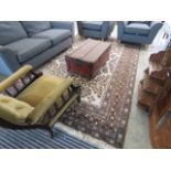 Brown and beige floral patterned Persian woolen carpet