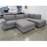 Grey fabric corner suite in 3 sections to include a footstool