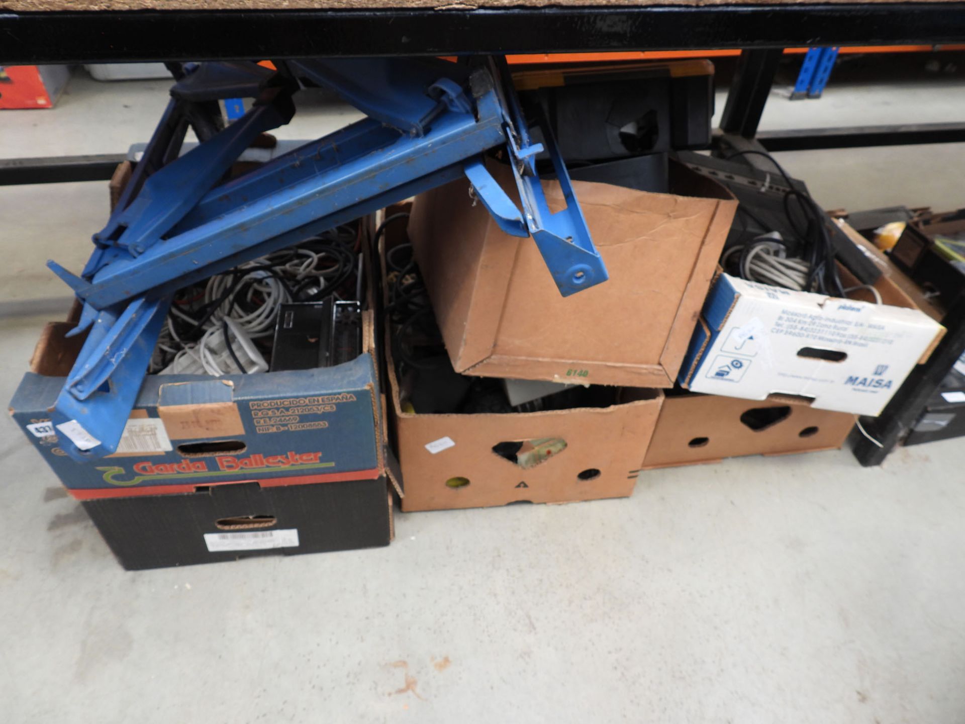 Large underbay of boxes inc,. radios, cables, workmate frame, cutting discs etc