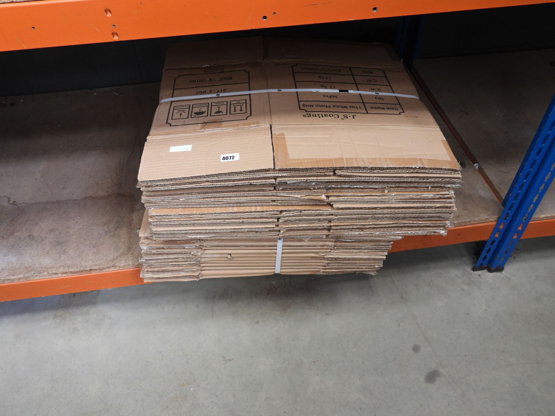 2 bundles of flat pack cardboard boxes
