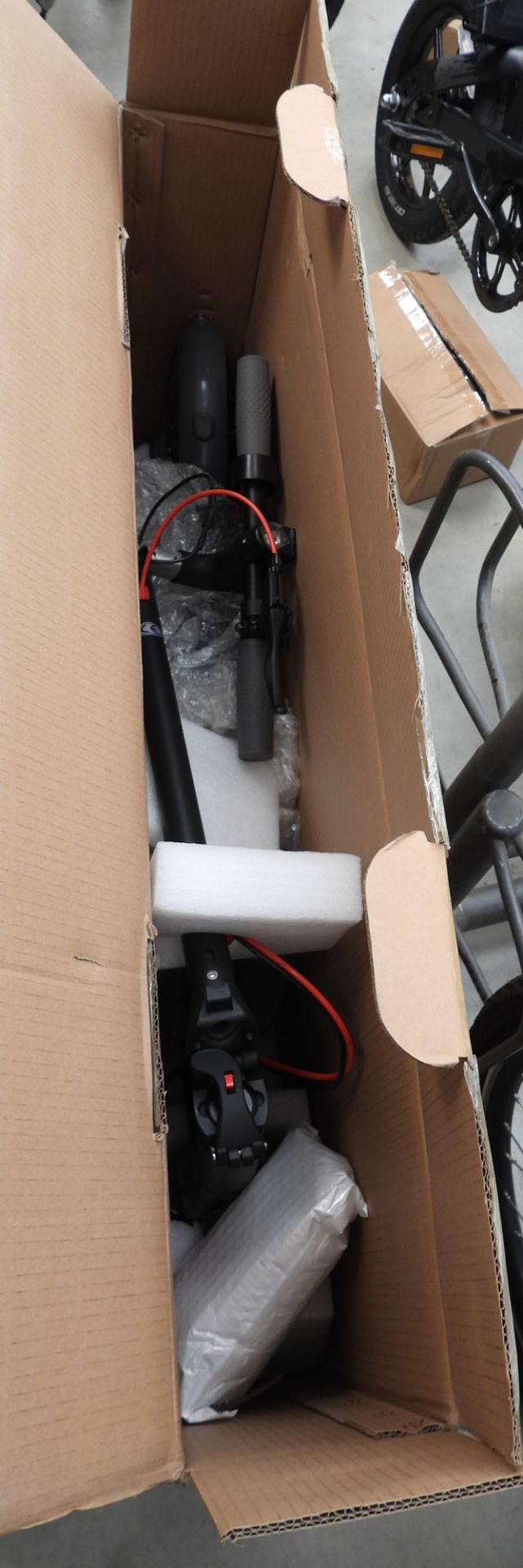 Boxed flat pack electric scooter