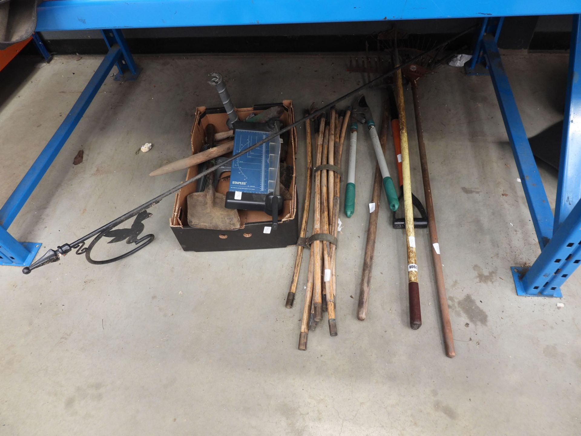 Small qty of garden tools, some drain rods, Staples guillotine, shelf brackets