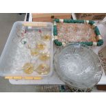 Wicker basket and plastic tub containing glassware plus a quantity of fruit bowls