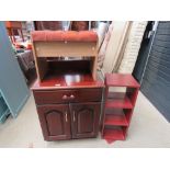 Upholstered stool, revolving CD rack, and double door cabinet