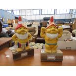 Pair of comical gnome figures