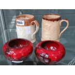 2 pearl ware ale flagons plus 2 Royal Doulton red glazed bowls