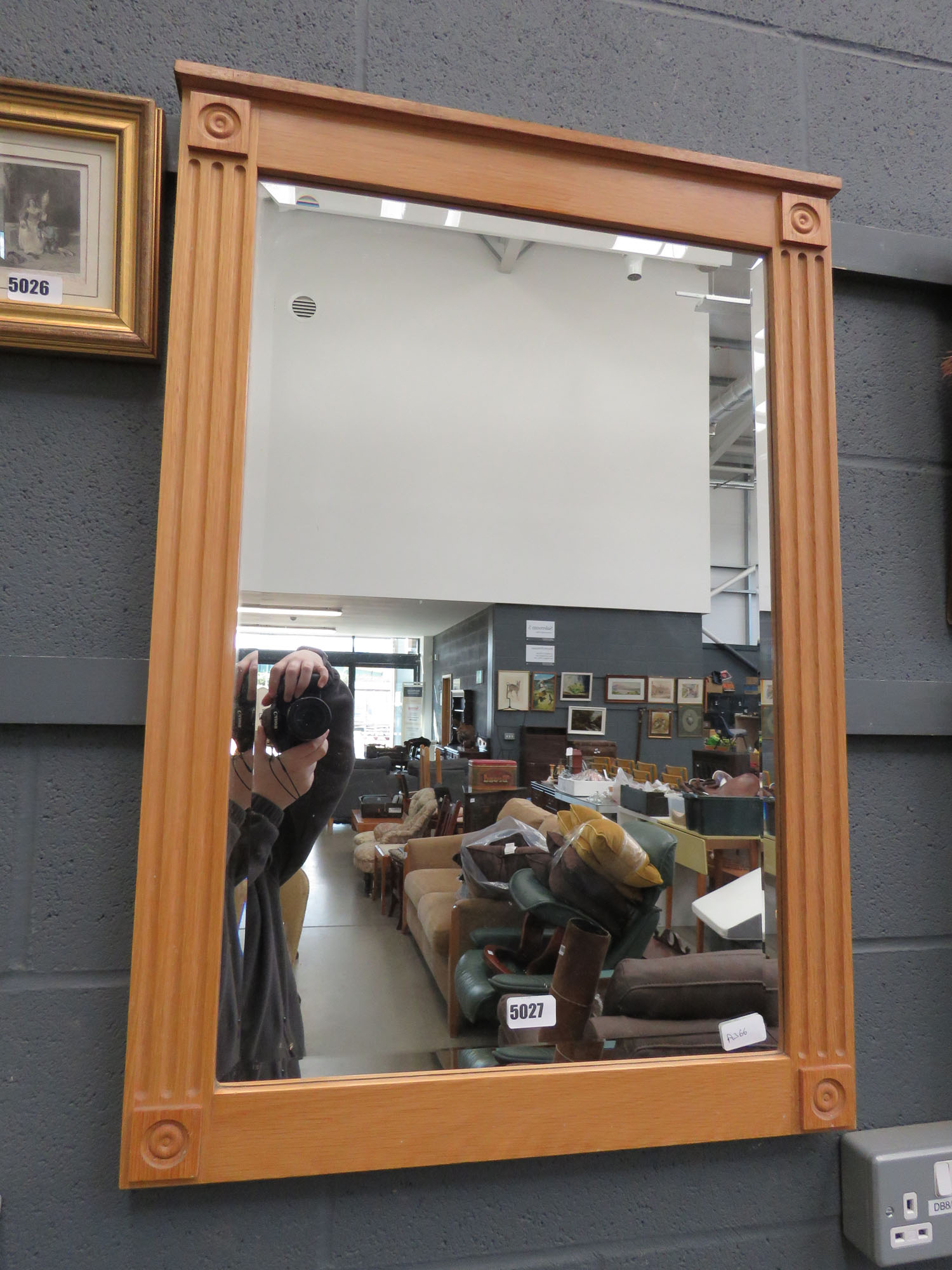 Rectangular bevelled mirror in oak frame