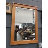 Rectangular bevelled mirror in oak frame