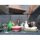Cage containing studio pottery