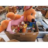 Box with board games and a toy kangaroo