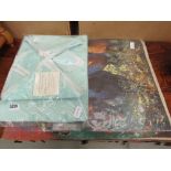 Green linen table cloth plus quantity of loose canvases incl. horse race, still life with jugs, view