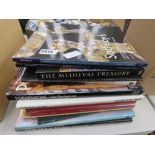 Pile of auction catalogues and reference books