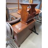 Dark oak dropside table with magazine rack