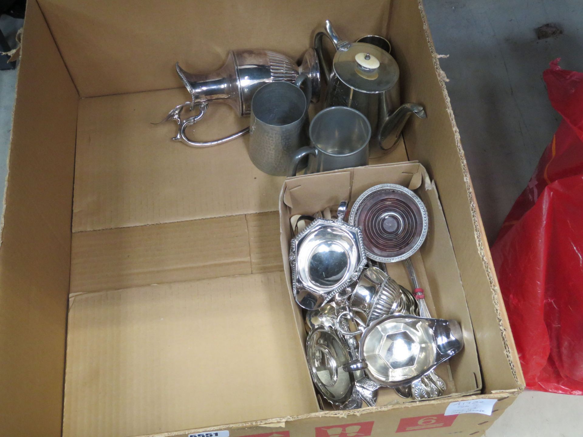 Box containing silver plate and pewter to include loose cutlery sets, coaster, gravy boats,