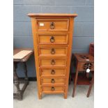 Narrow pine chest of 7 drawers