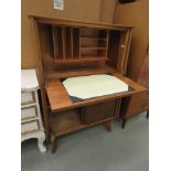 Walnut fall front bureau with sliding doors under