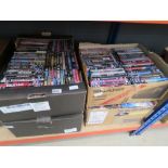 4 boxes containing DVD's