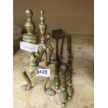 Pair of brass fire dogs plus a 3 piece fire companion set