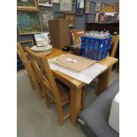 Oak extending dining table plus 4 chairs