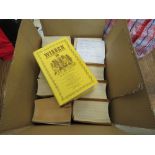 Box containing a quantity of Wisden cricketing almanacs