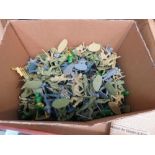 Box containing plastic toy soldiers