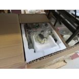 2 boxes containing furniture parts and a lamp