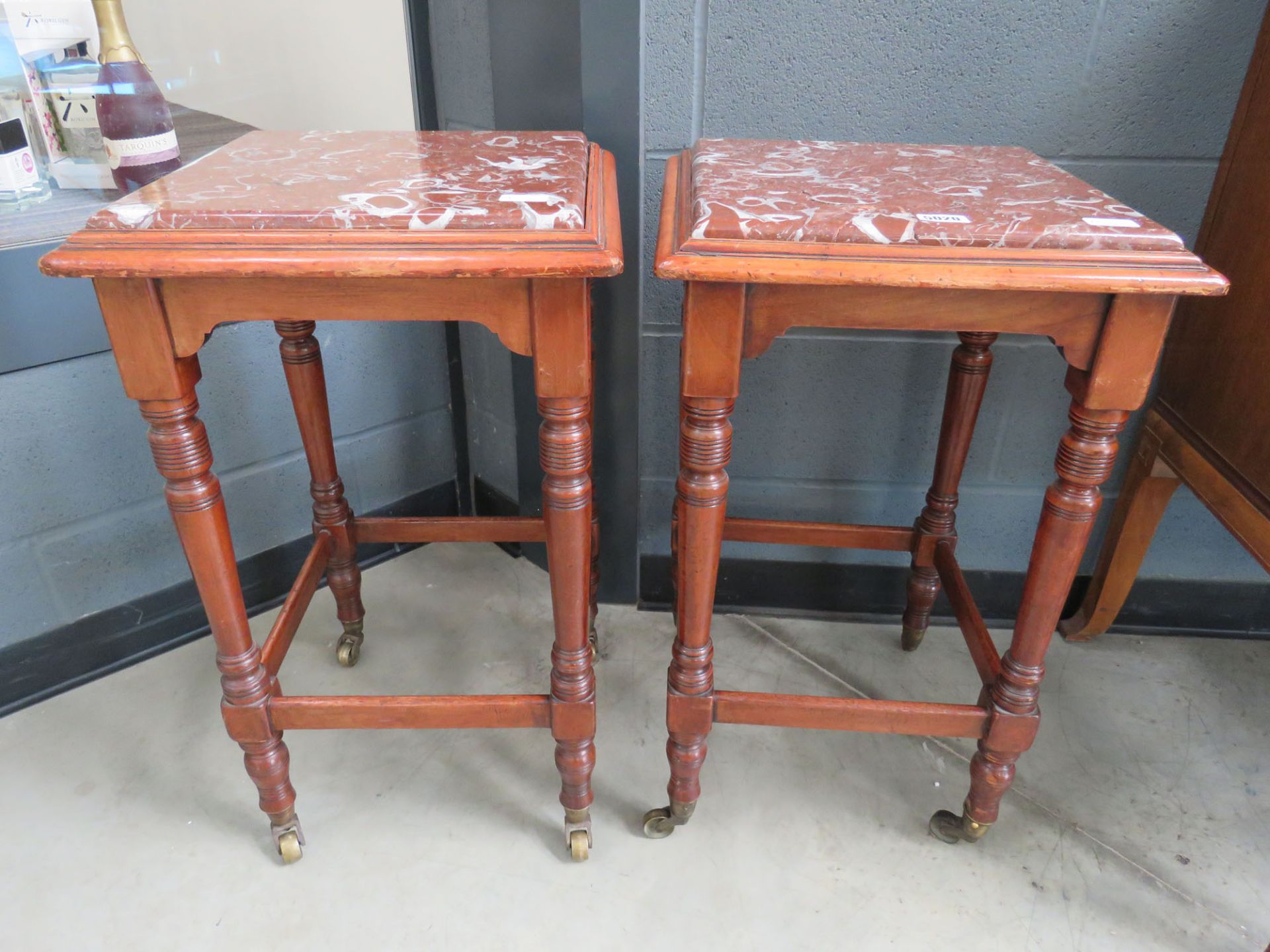 Pair of mahogany and marble Victorian plant stands