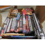 2 boxes containing Harry Potter novels, Star Trek, Judge Dredd and other books