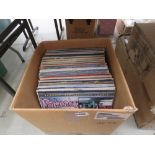 Box containing 75+ vinyl records incl. punk, new wave, rock, soul etc.