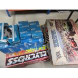 (6) 2 boxed Scalextric sets, 2 boxed cars, 2 boxed throttles and some boxed curves