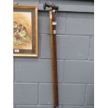 Walking stick with silver collar plus one other with brass handle