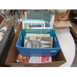 2 boxes containing books pertaining to the history of Bedford and Garden Answer magazines