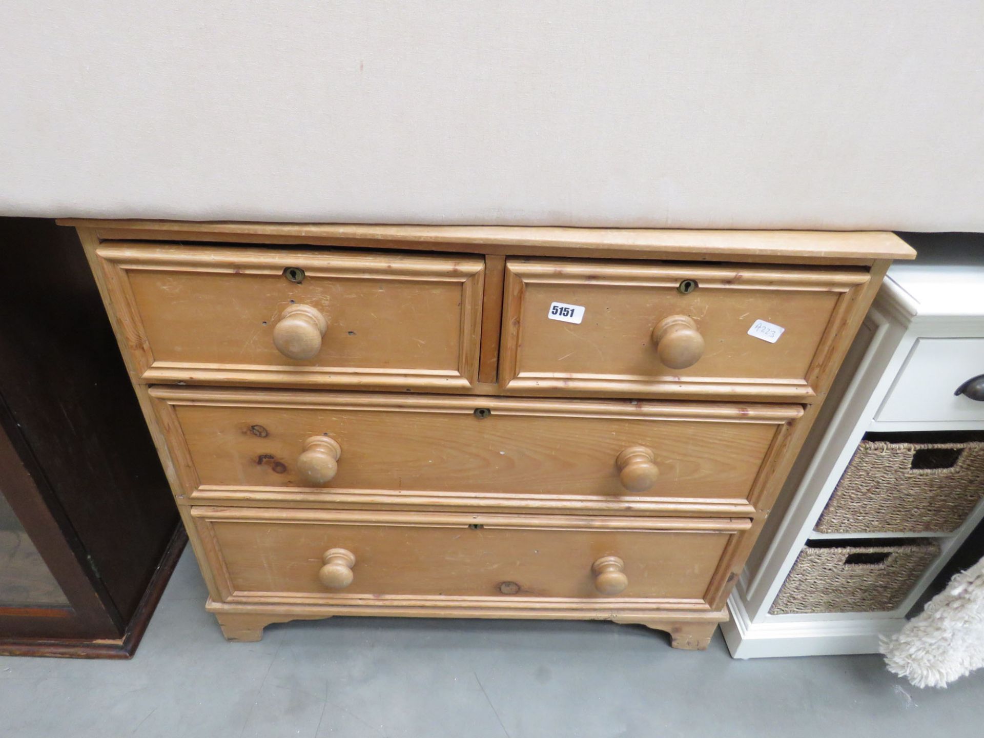 Stripped pine chest of 2 over 2 drawers