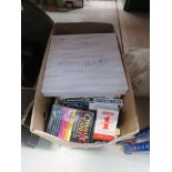 Box containing dominoes set plus models and cards