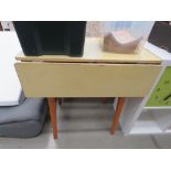 Yellow melamine dropside table