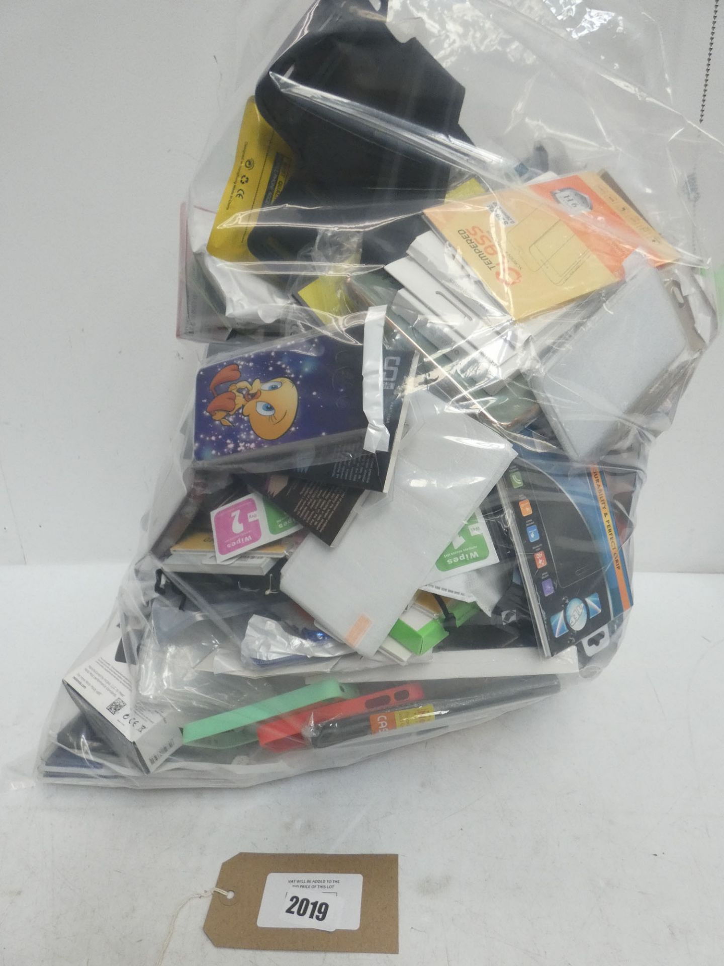 Bag containing quantity of mobile phone cases and covers