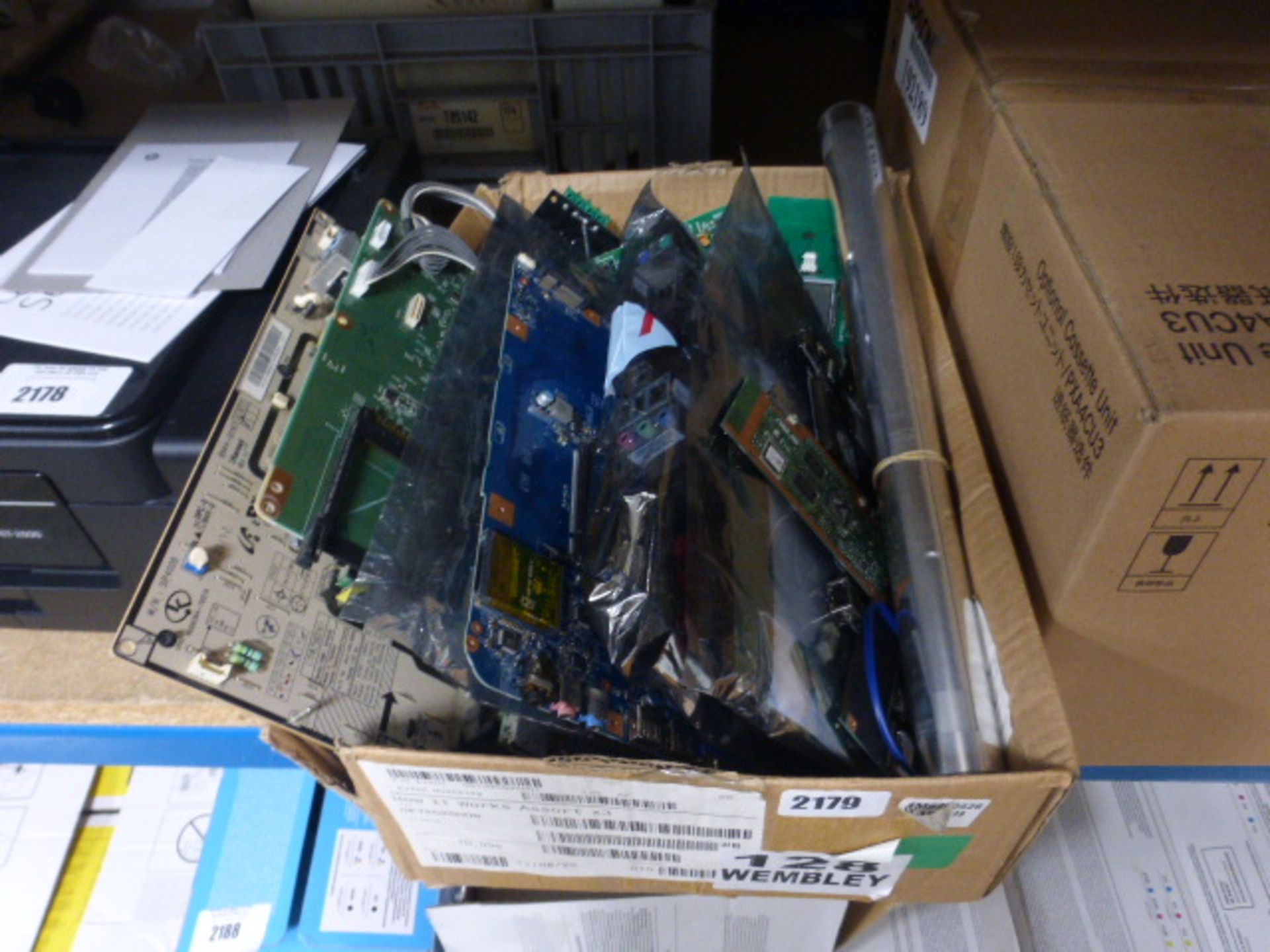 Box containing various laptop, Pc and mother boards