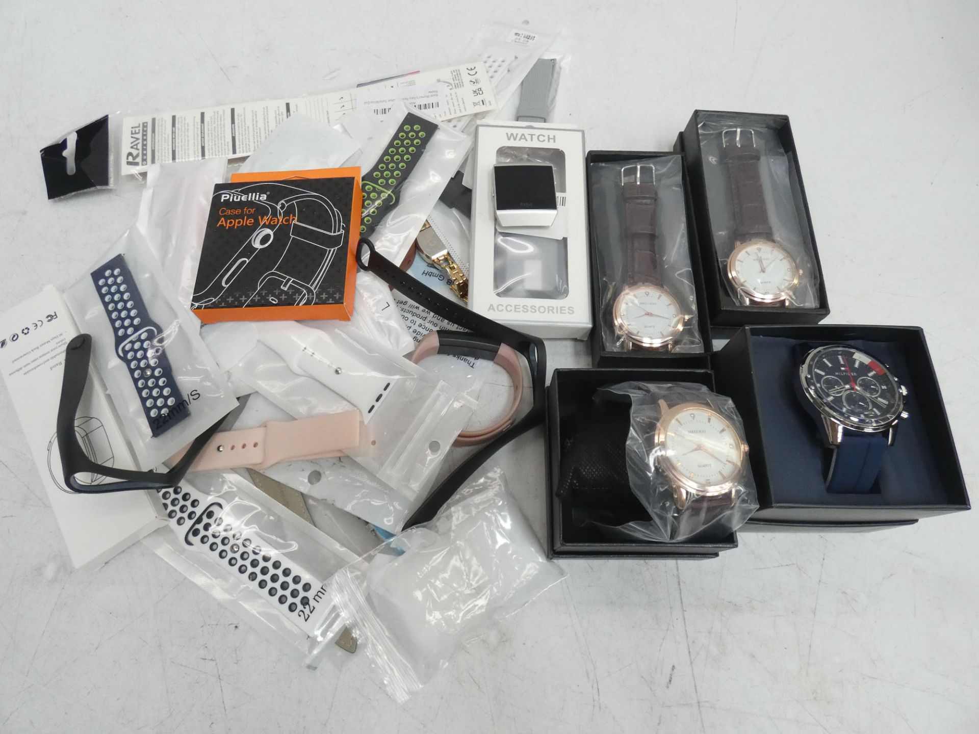 Quantity of boxed and loose wristwatches and straps