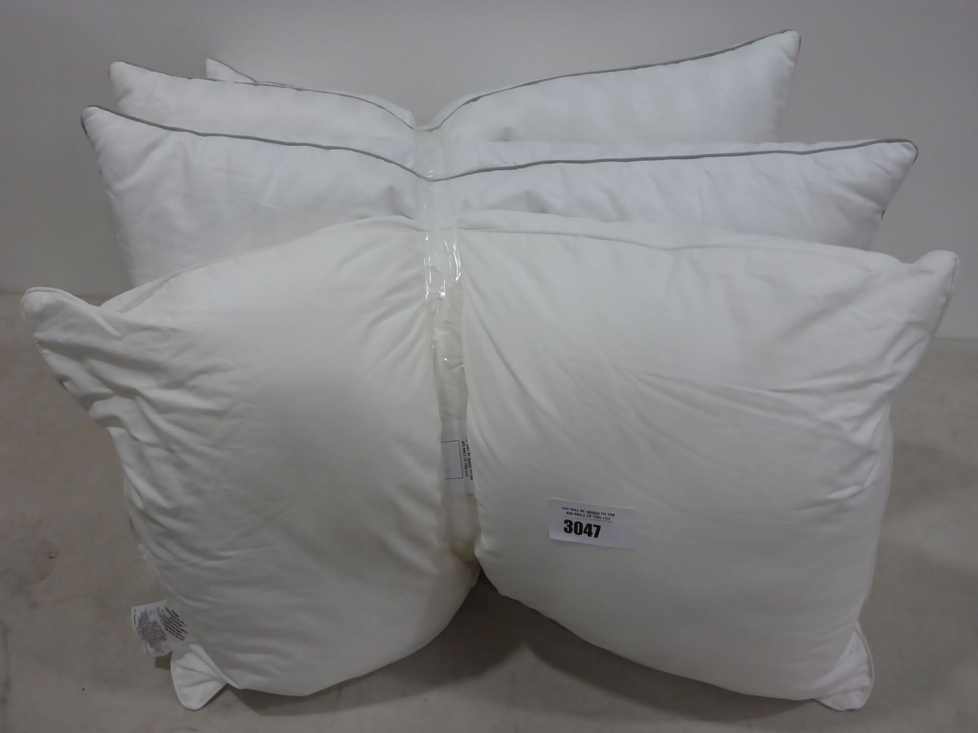 Four unbagged pillows