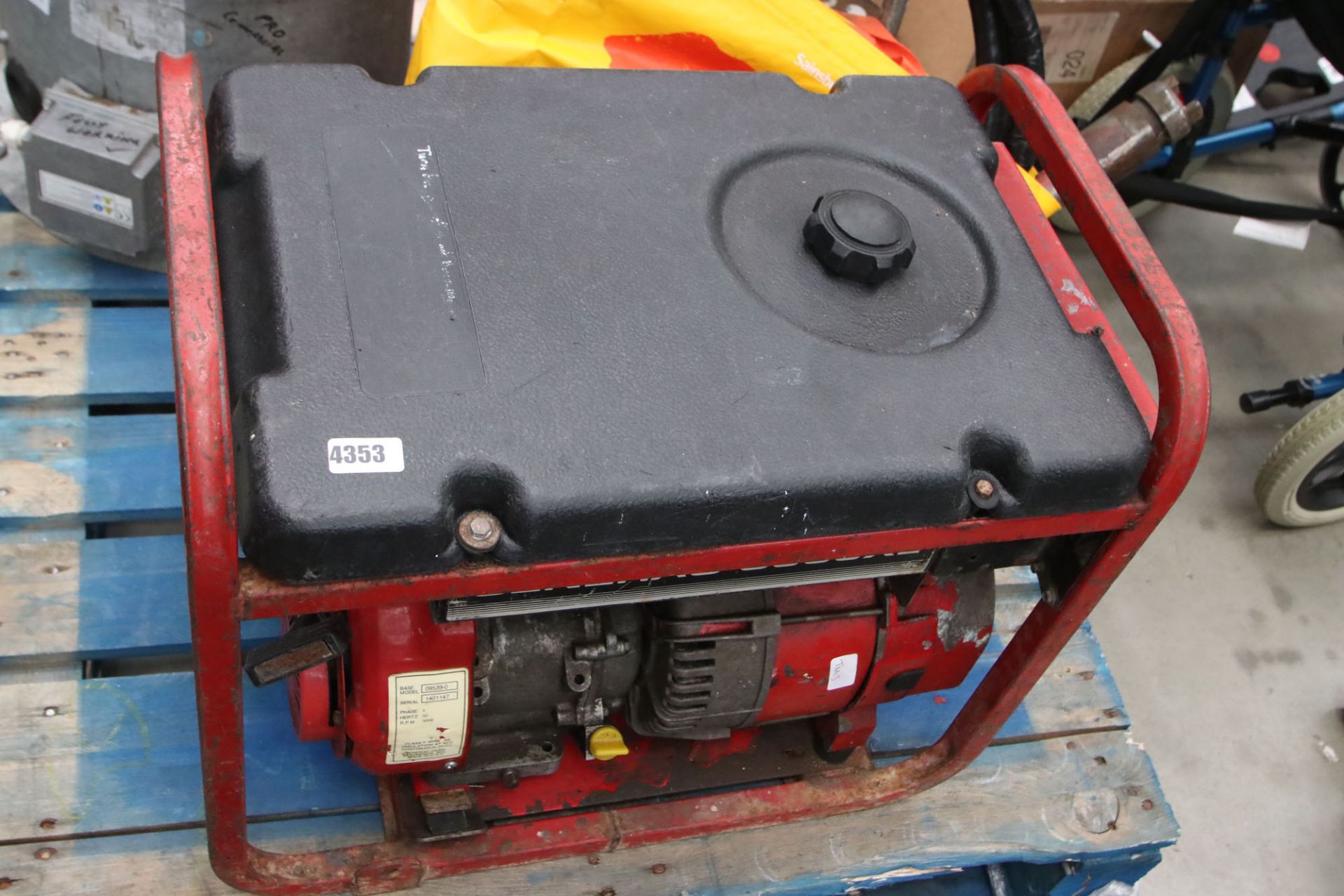 Large red petrol powered generator