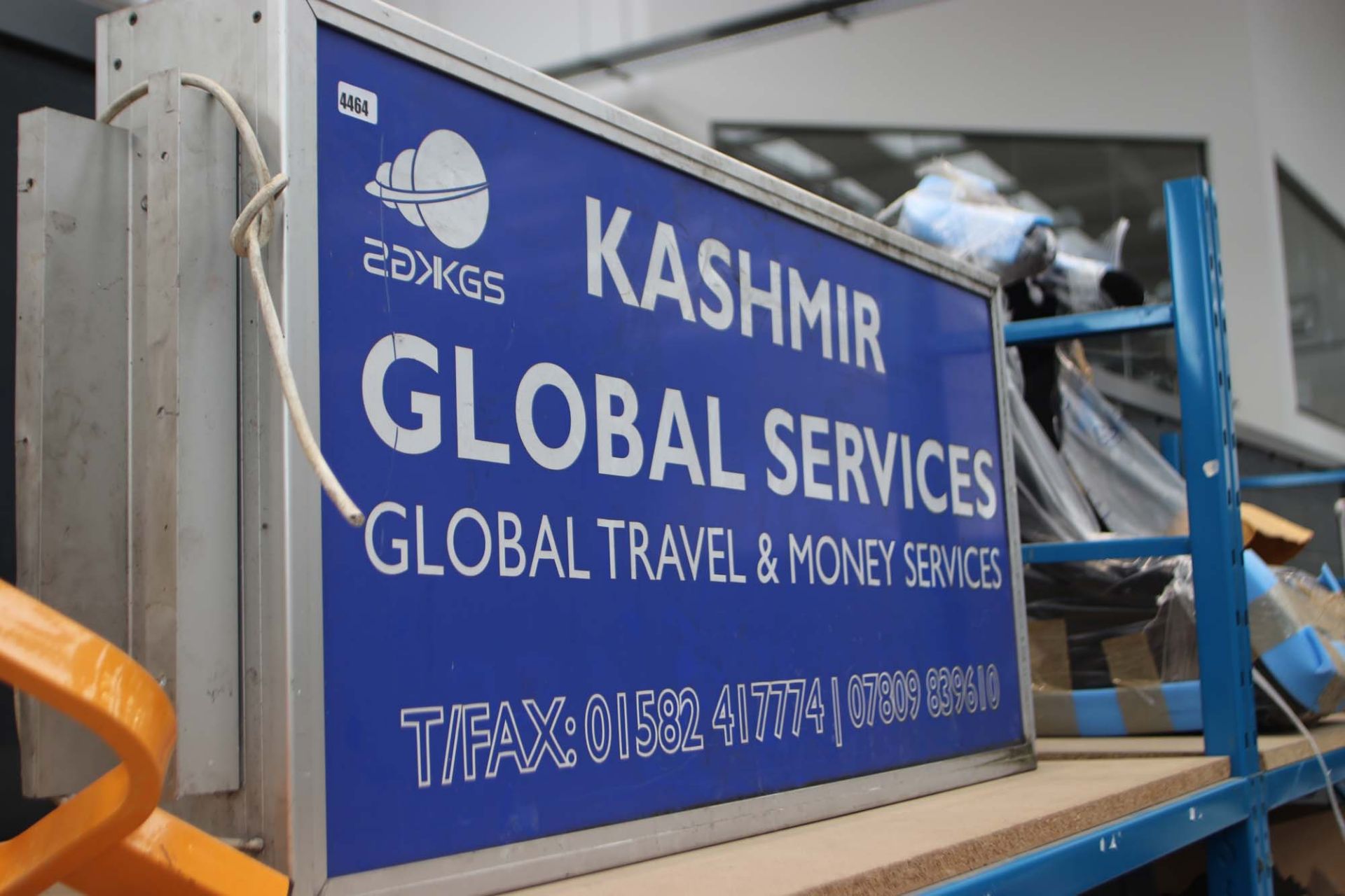 Kashmir global services travel and money services illuminated sign