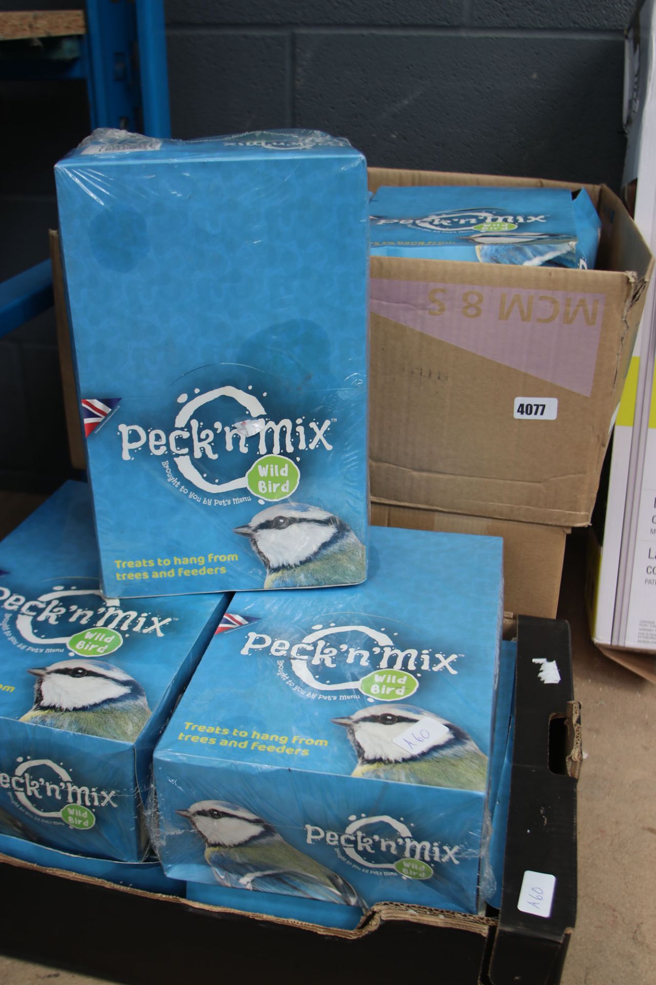 3 large boxes of Peck & Mix bird food