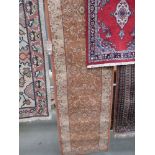 (3) Carpet runner in brown with floral design