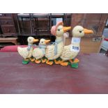 Cast iron door stop of 4 ducks