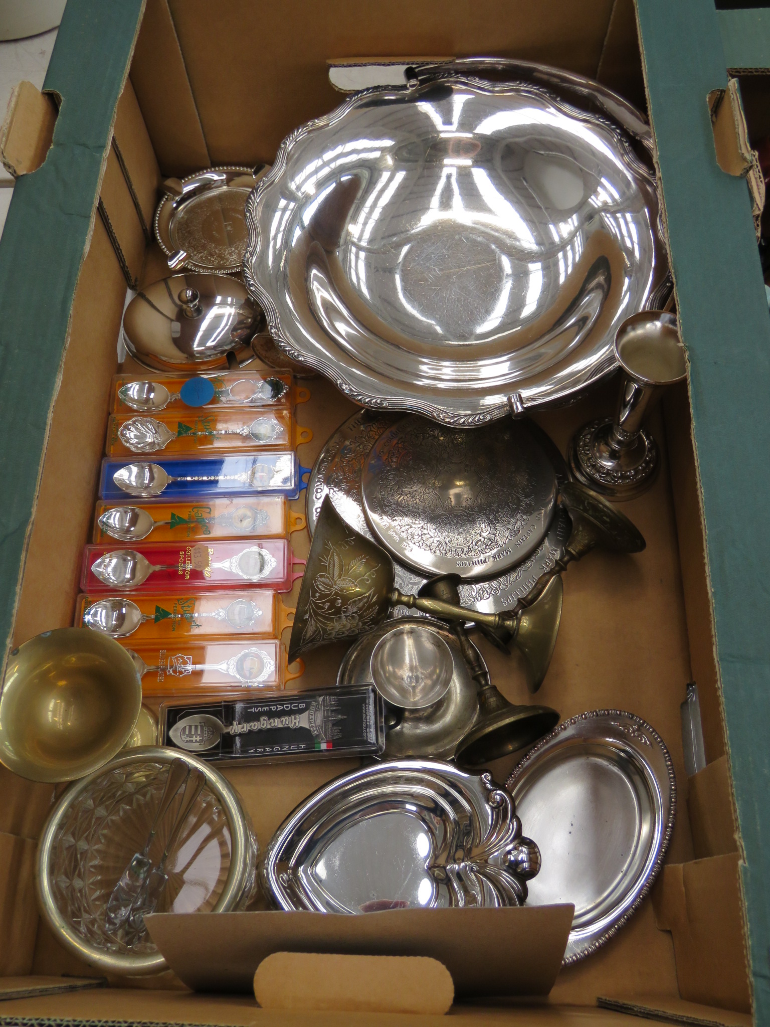 Single box of white metal ware inc. wine glasses, trays, place mats, collectable spoons etc