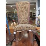 Bedroom chair on turned feet with floral tapestry upholstery