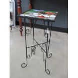 Stained glass-topped metal table