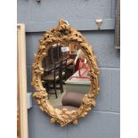 Oval gilt framed mirror