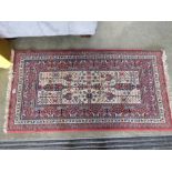 Louis De Portiere carpet with floral and geometric design in red and blue